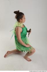 KATERINA KNNELING POSE WITH SWORD